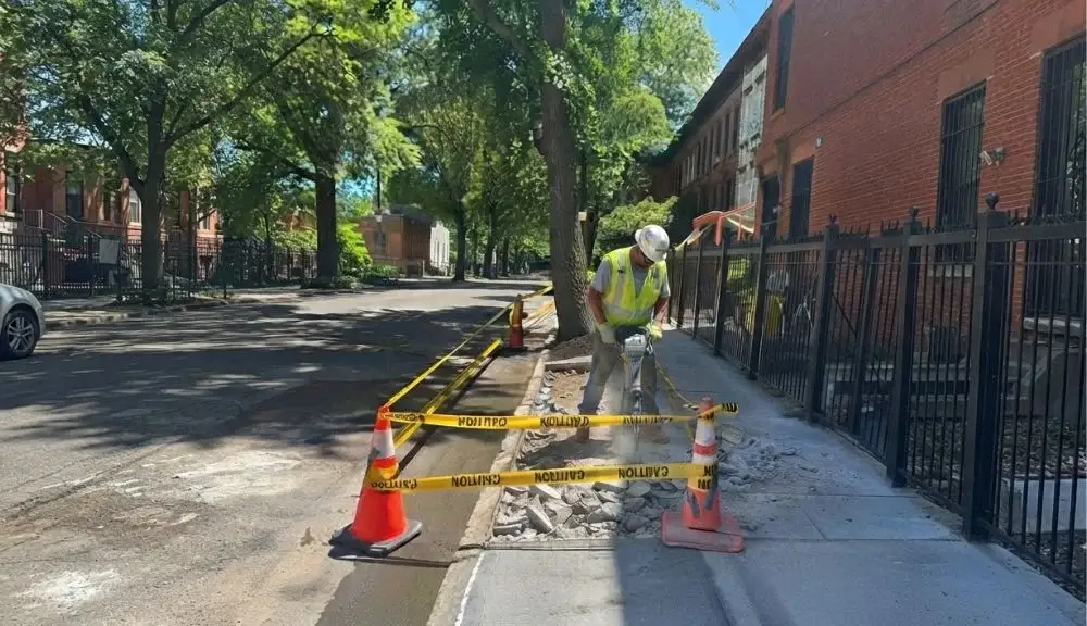 Sidewalk repair execution at 32 Downing St, Brooklyn